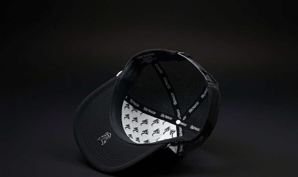 Black cap with white pattern on a black background